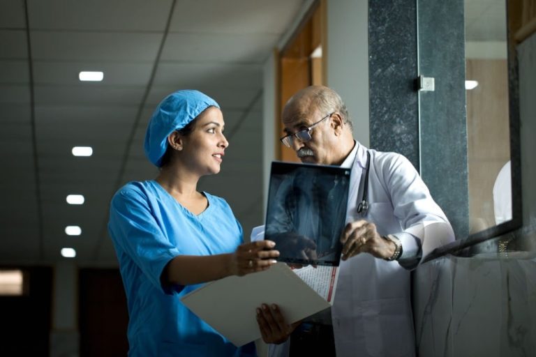 Indian doctor reviewing patient X‑ray scan for real‑time diagnostic evaluation